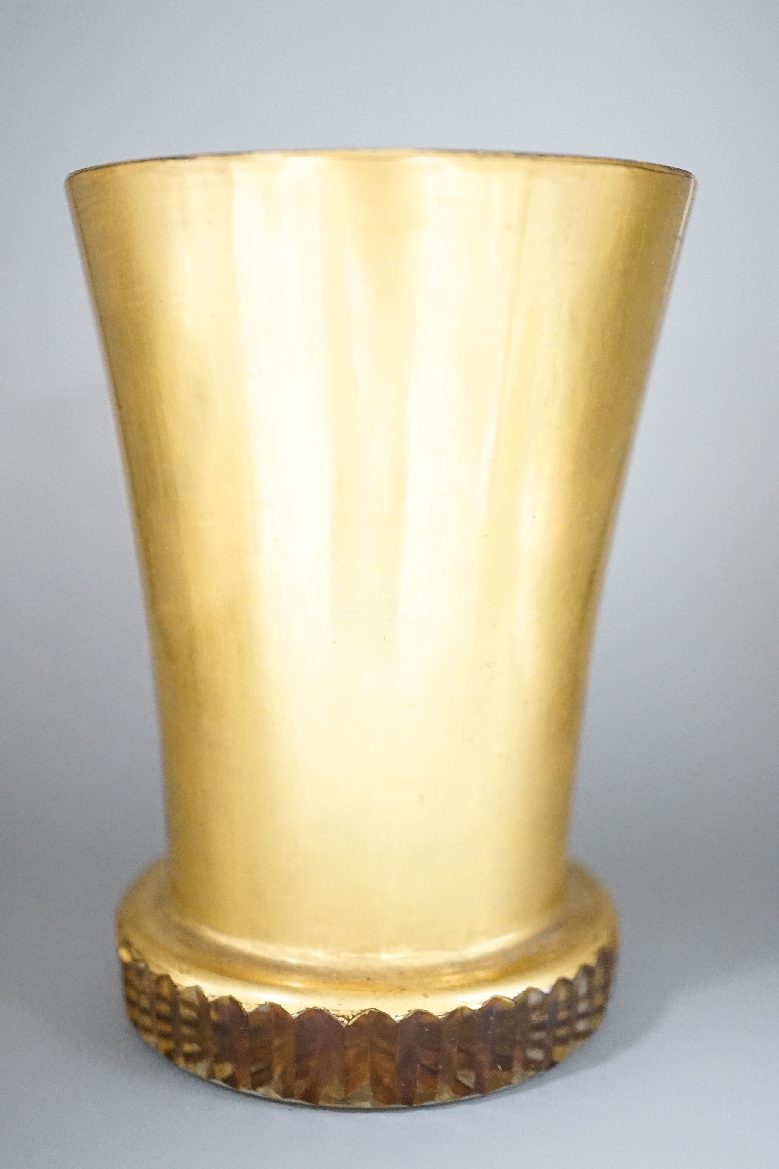 A 19th century Bohemian enamelled and gilded glass beaker 11cm, with titled scene Layenburg bei Wien